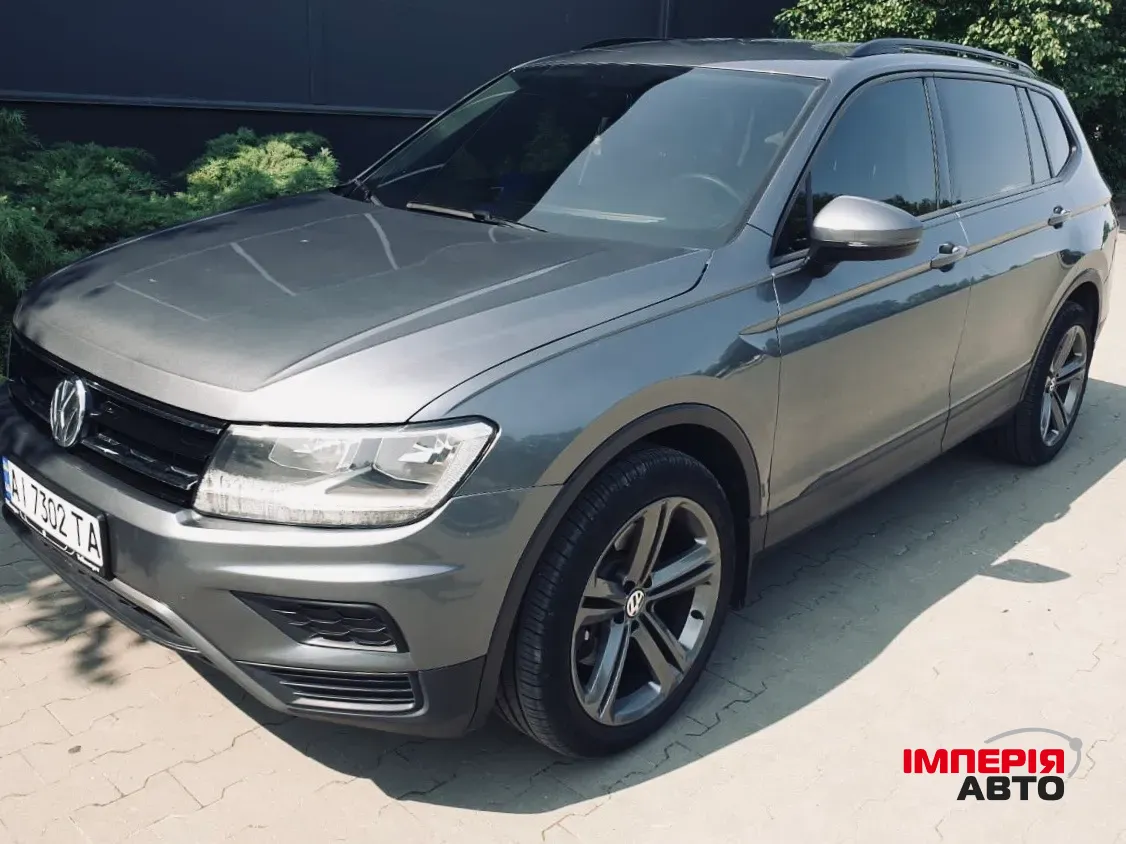 Volkswagen Tiguan - фото 1