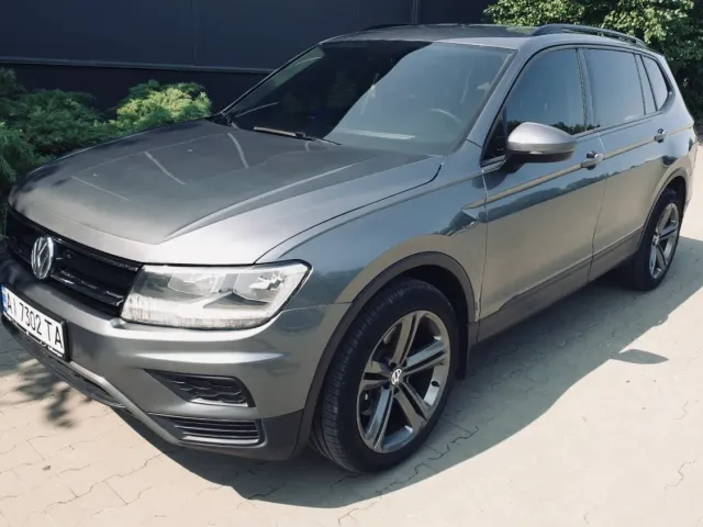 Volkswagen Tiguan - фото 1
