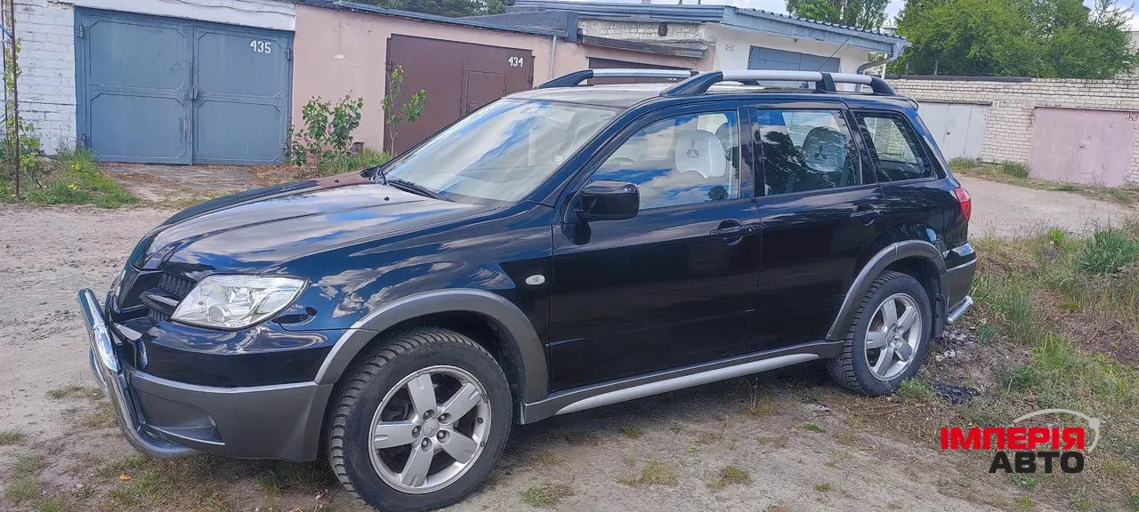 Mitsubishi Outlander - фото 3