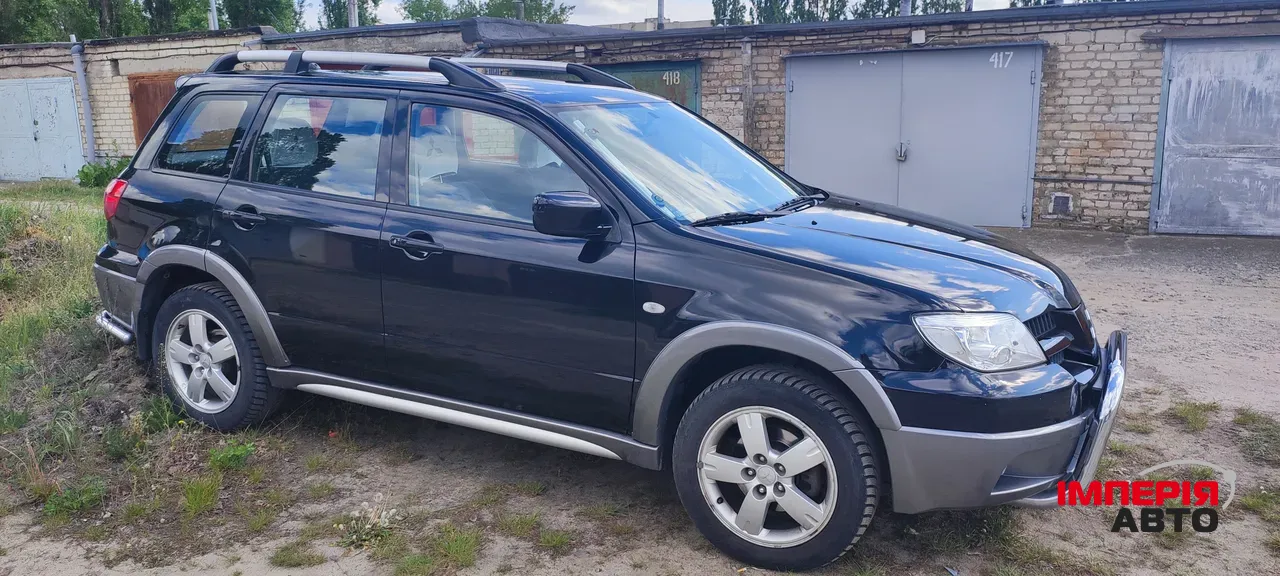 Mitsubishi Outlander - фото 2