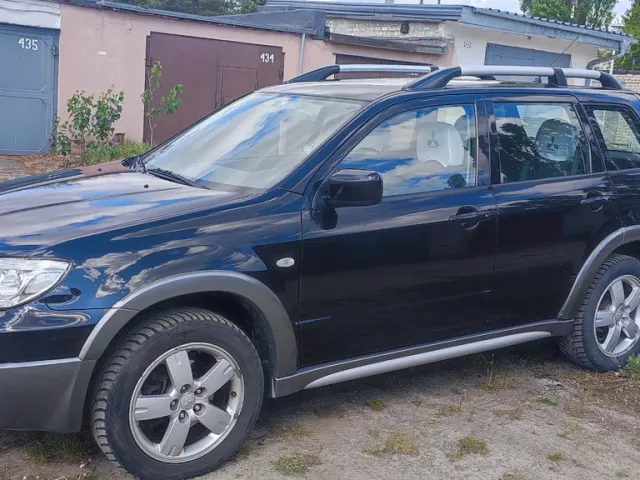 Mitsubishi Outlander - фото 3