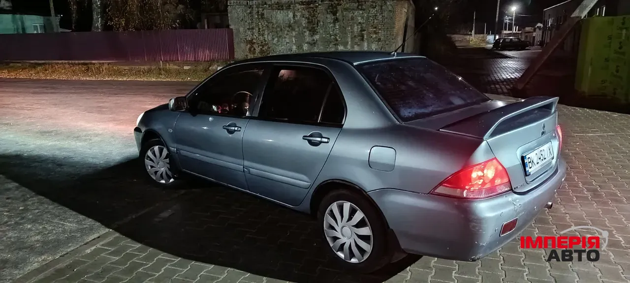 Mitsubishi Lancer - фото 4