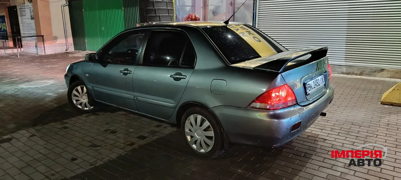 Mitsubishi Lancer - фото 2