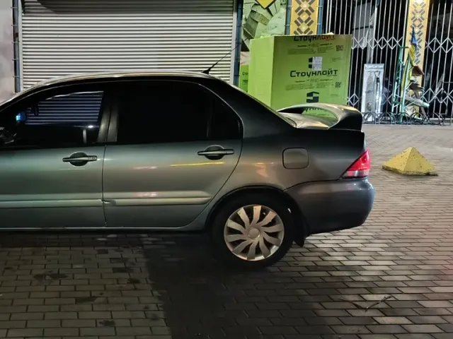 Mitsubishi Lancer - фото 3