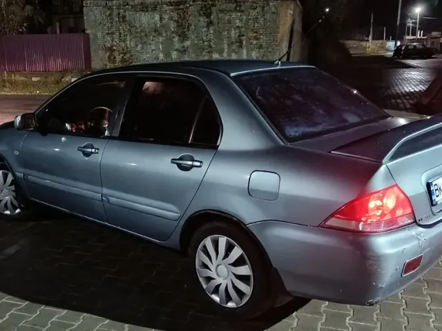 Mitsubishi Lancer - фото 4