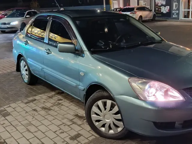 Mitsubishi Lancer - фото 1