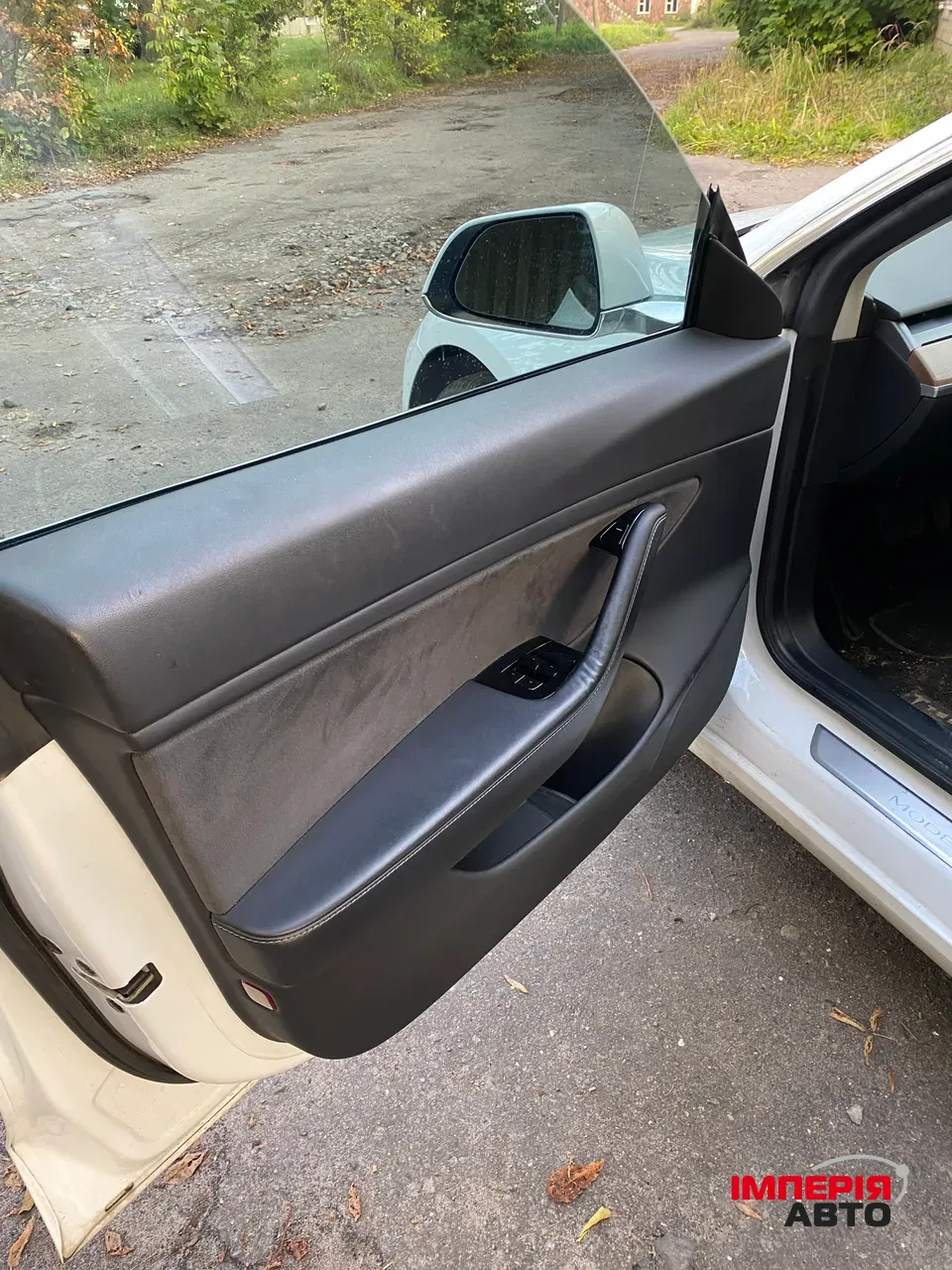 Tesla Model 3 - фото 10