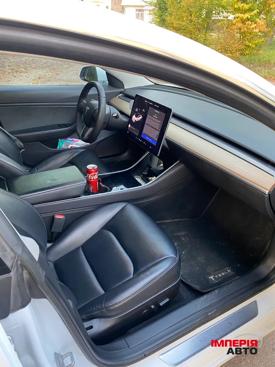 Tesla Model 3 - фото 12