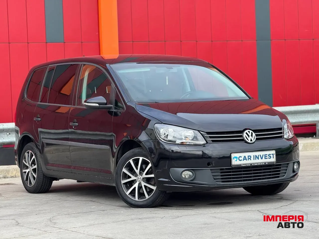 Volkswagen Touran - фото 1