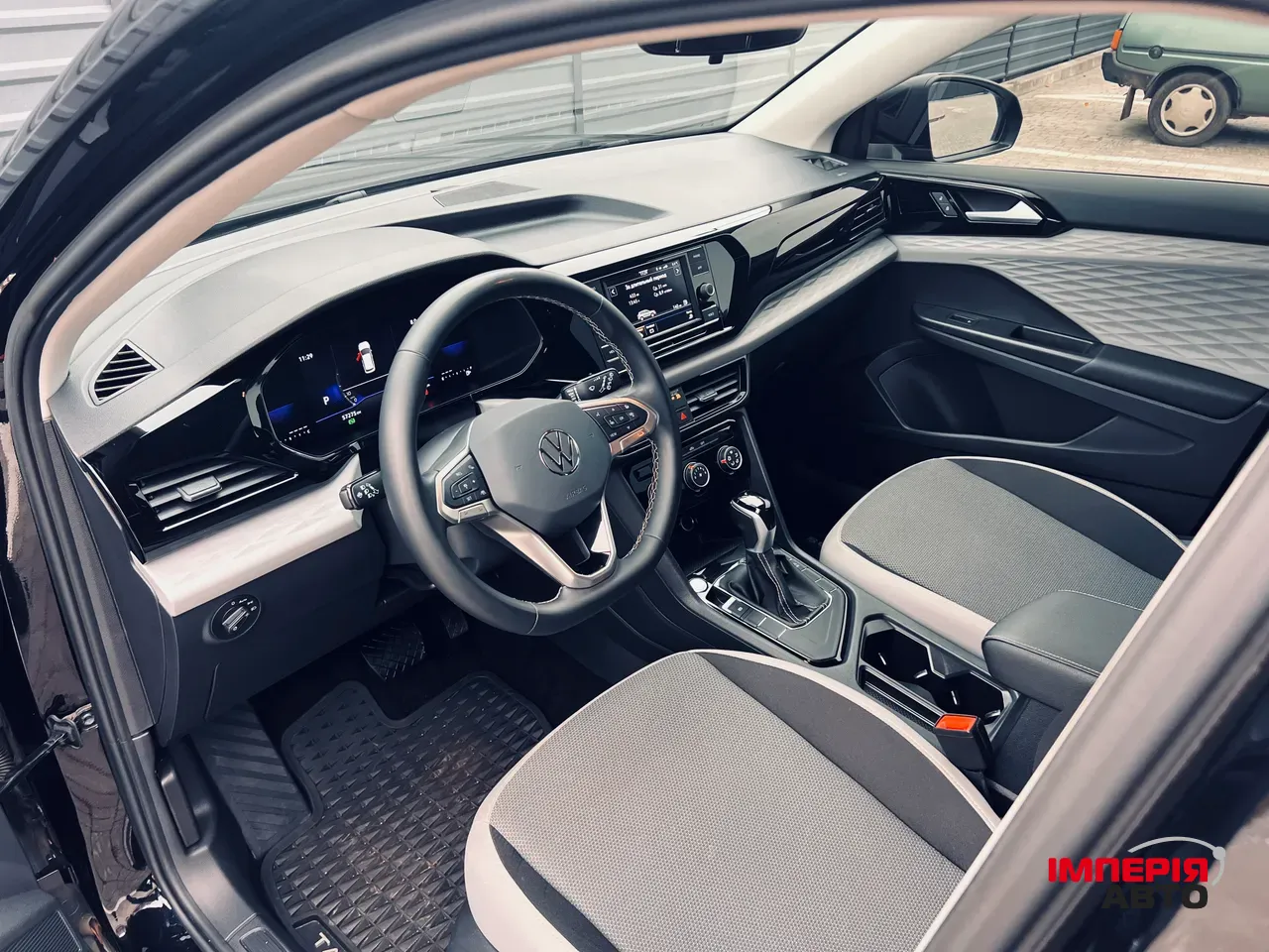 Volkswagen Taos - фото 11