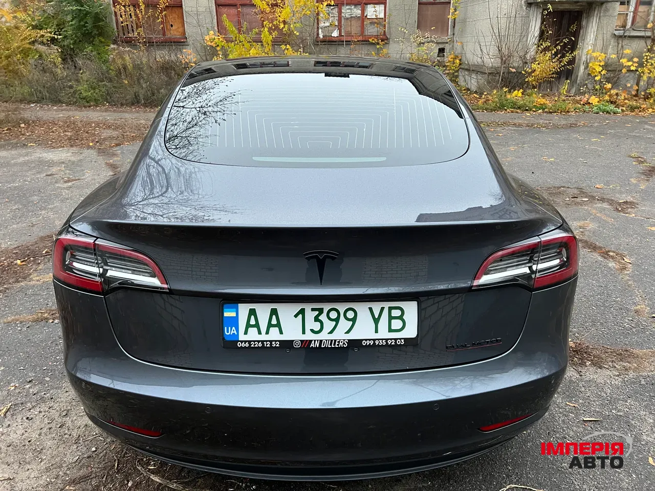 Tesla Model 3 - фото 10