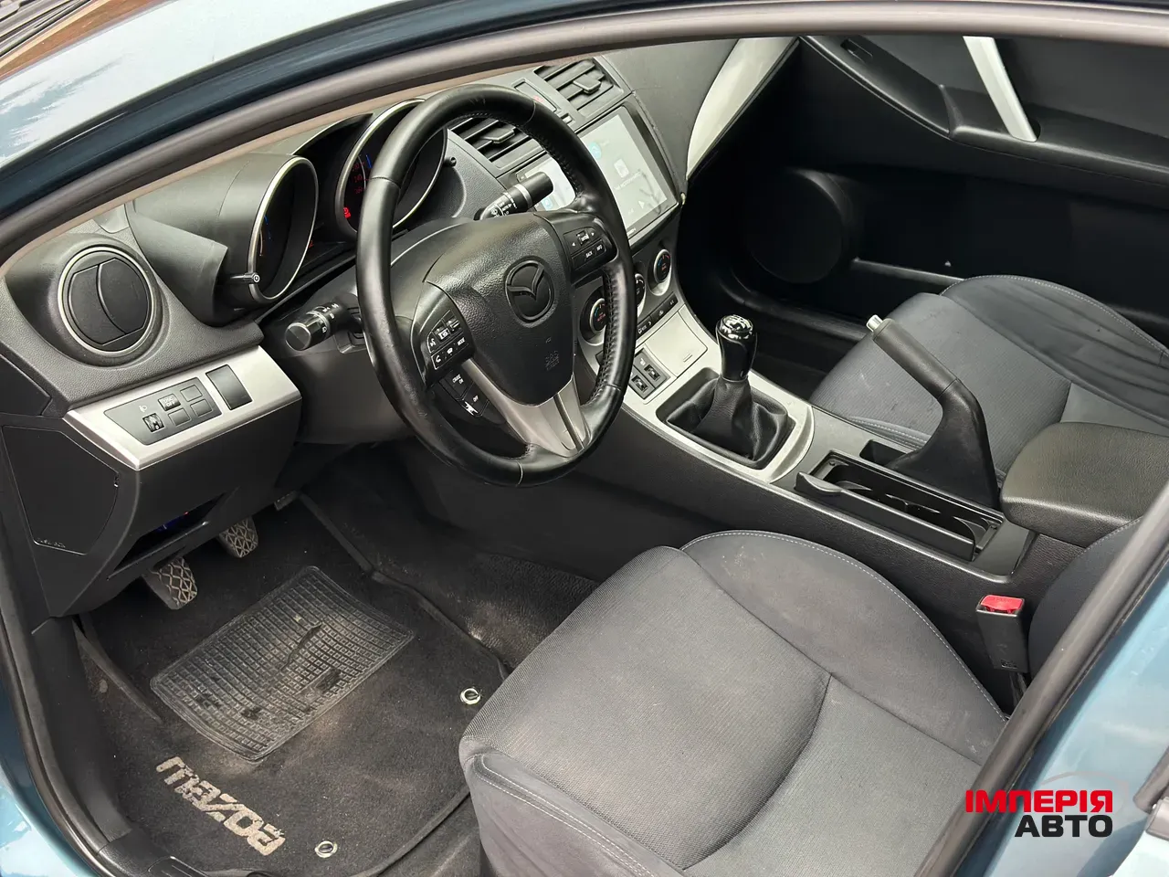 Mazda 3 - фото 7