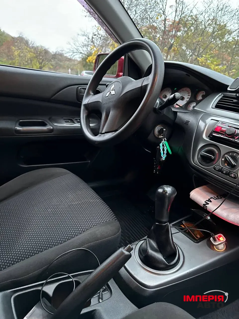 Mitsubishi Lancer - фото 9