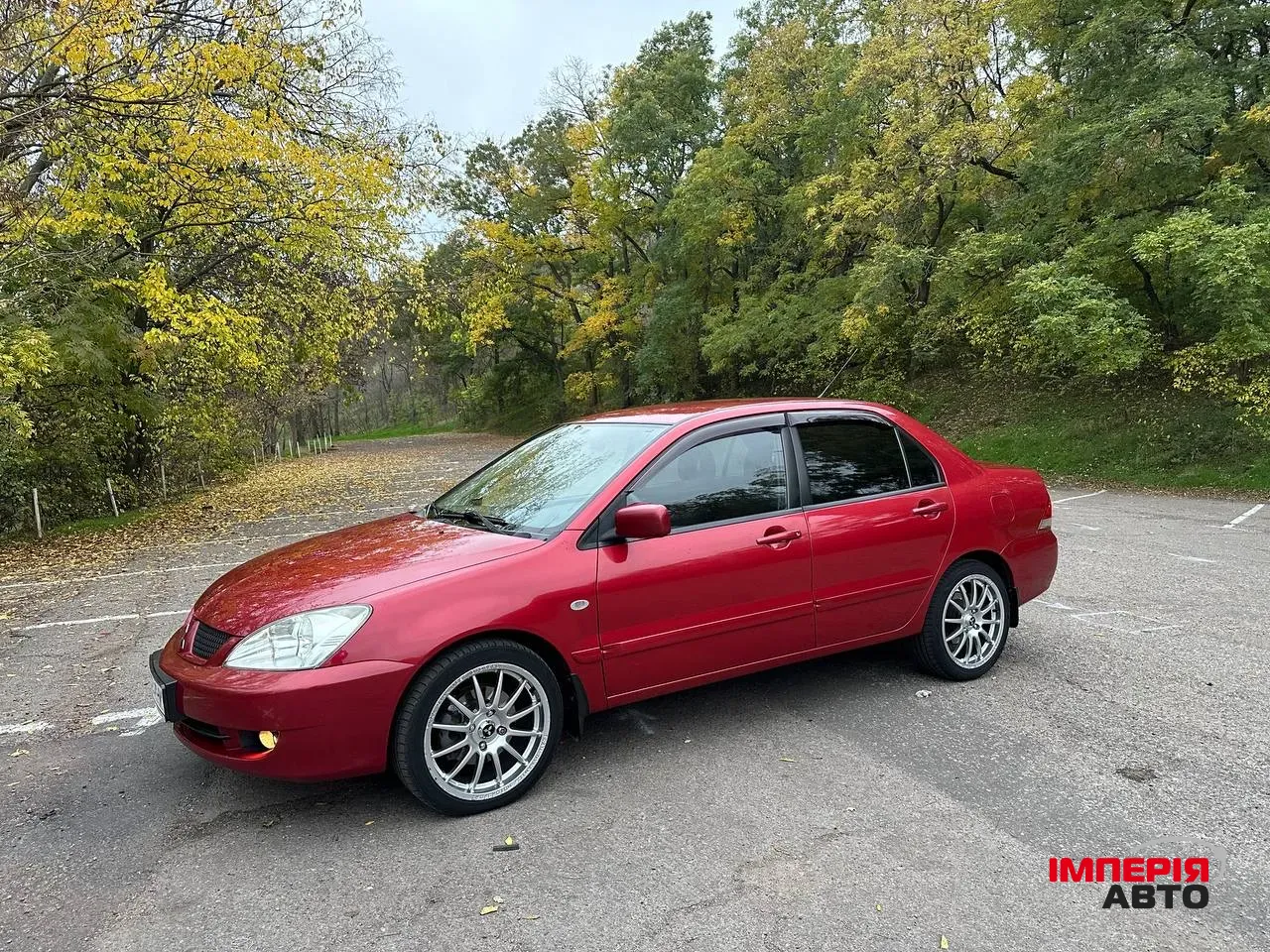 Mitsubishi Lancer - фото 1