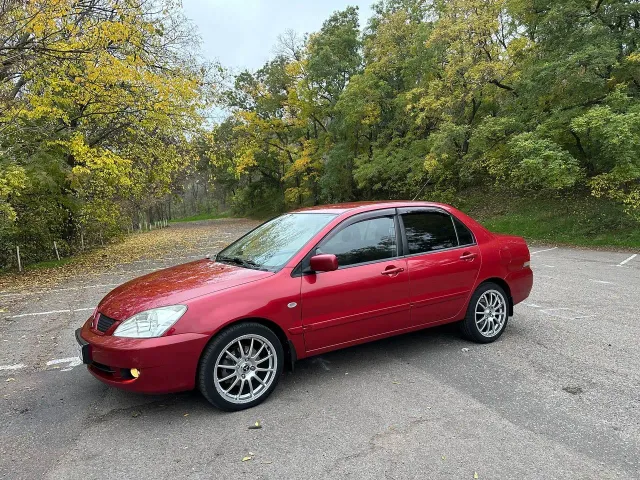 Mitsubishi Lancer - фото 1