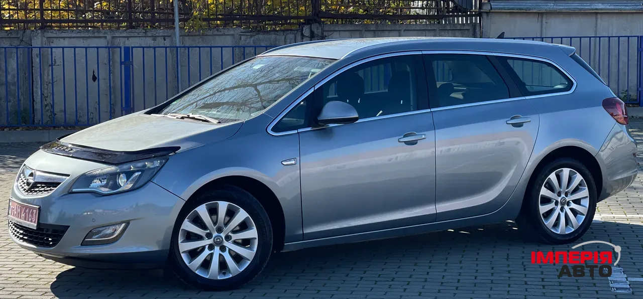 Opel Astra - фото 8