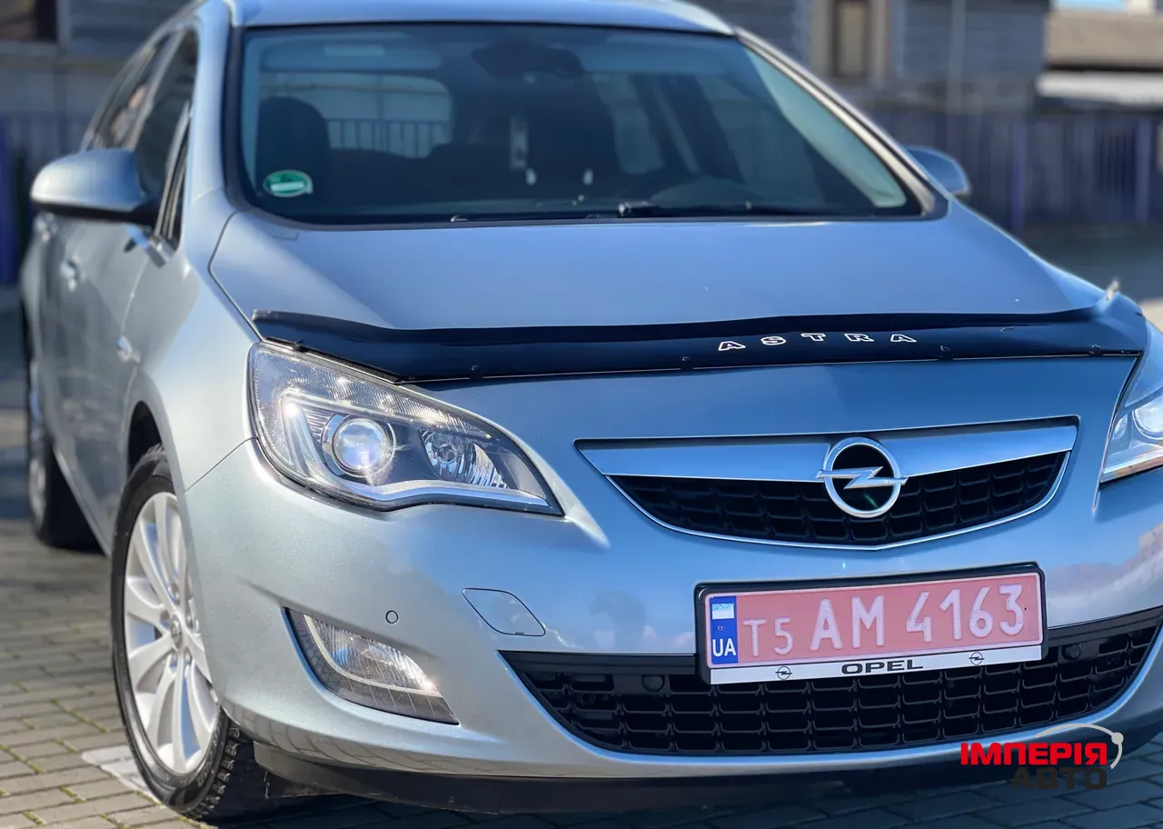 Opel Astra - фото 14