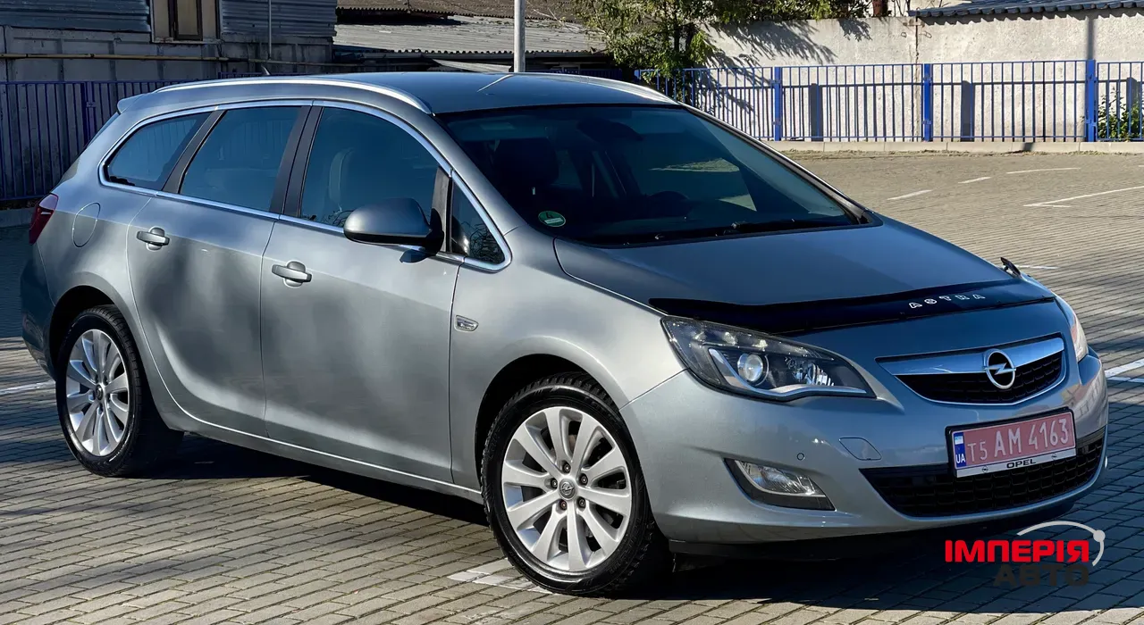 Opel Astra - фото 12