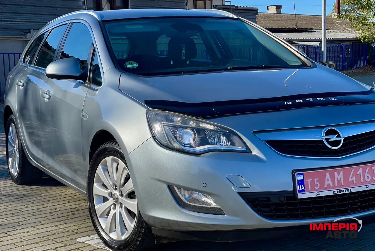 Opel Astra - фото 13