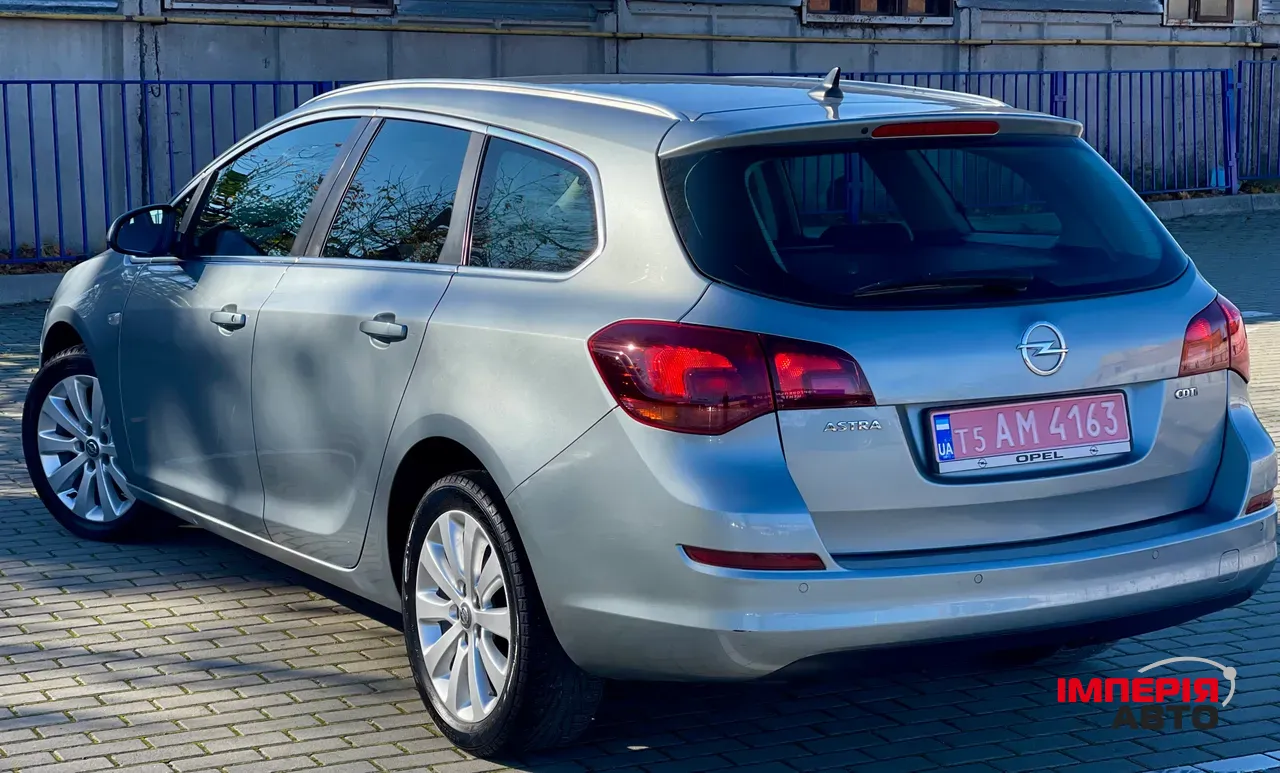Opel Astra - фото 20
