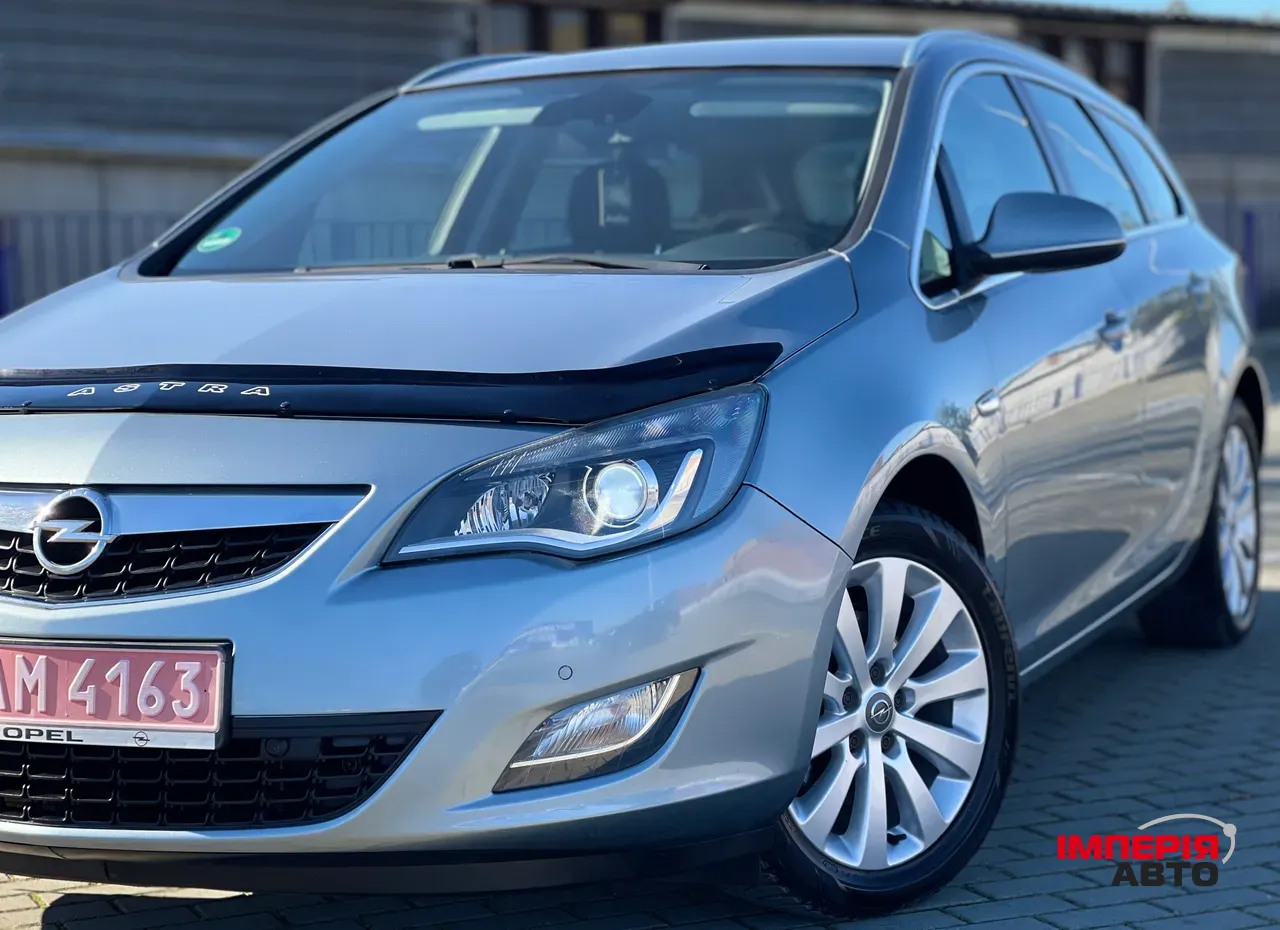 Opel Astra - фото 7