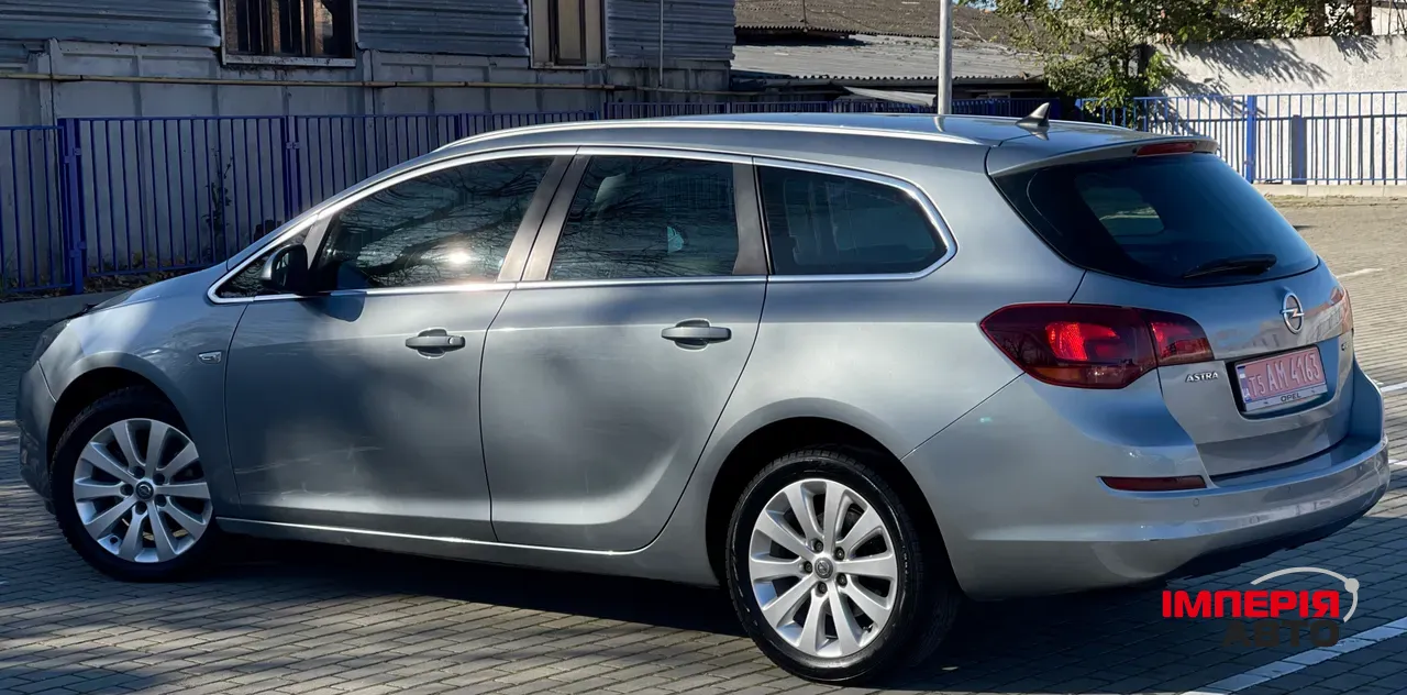 Opel Astra - фото 18