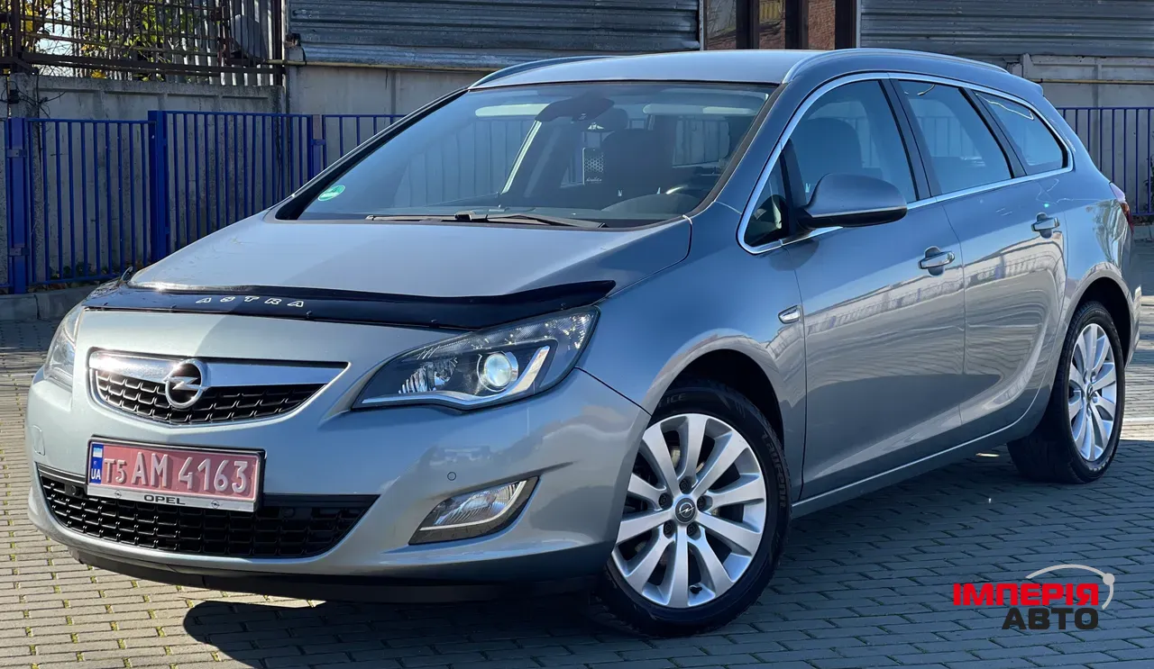Opel Astra - фото 1