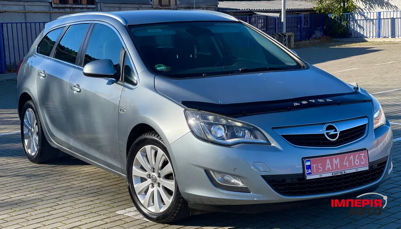 Opel Astra - фото 11