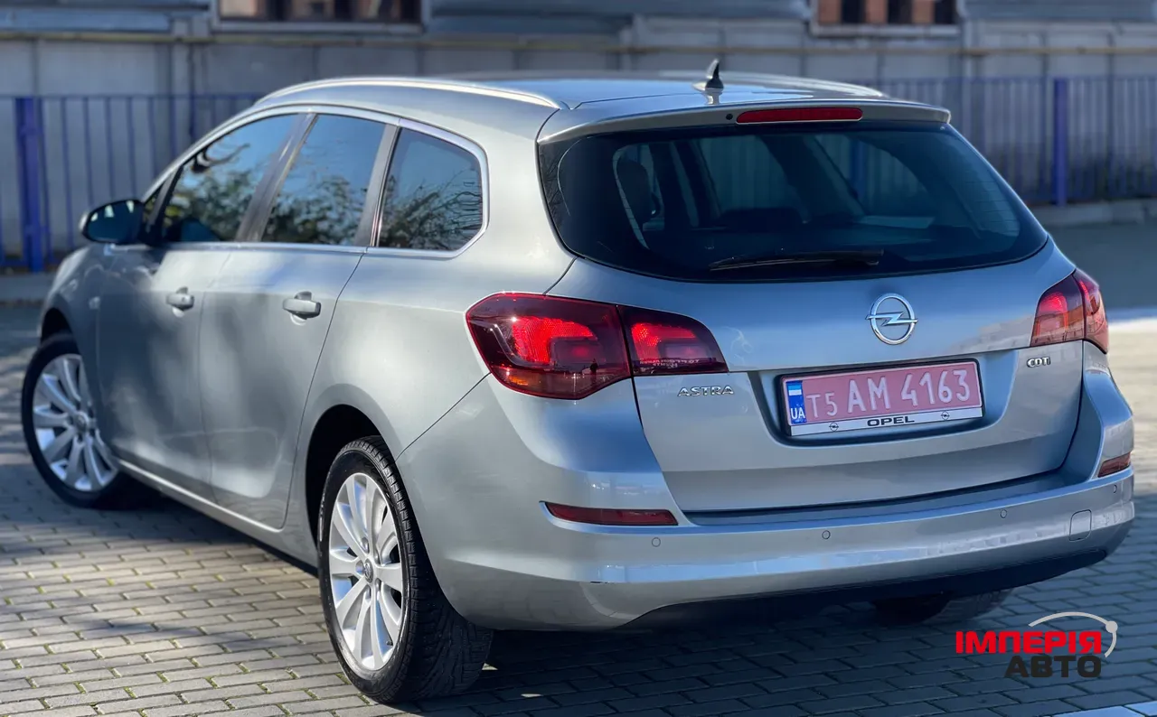 Opel Astra - фото 17