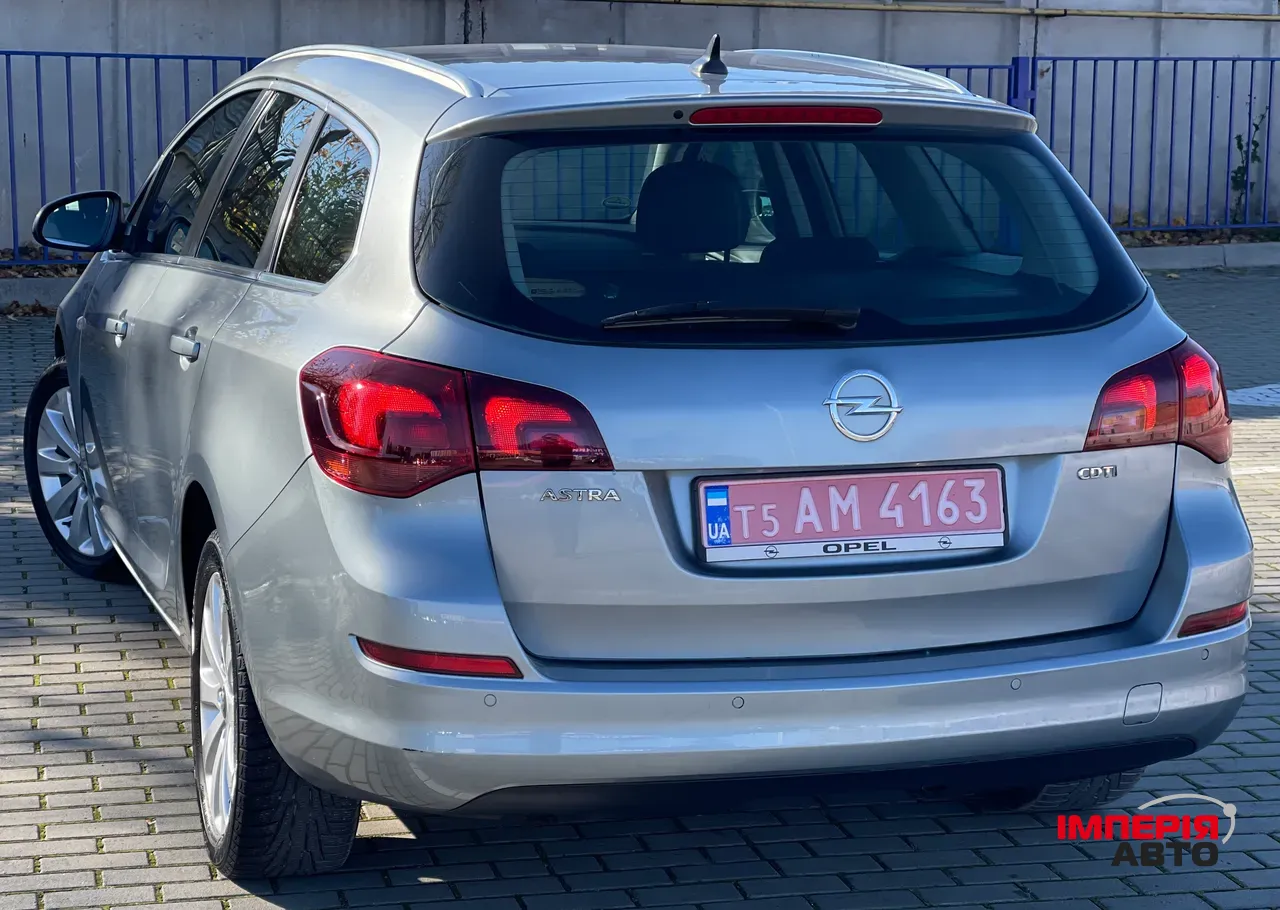 Opel Astra - фото 19