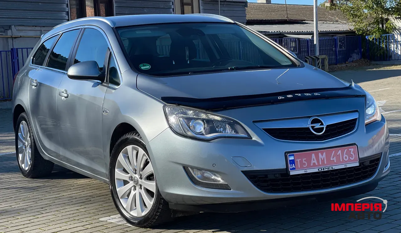Opel Astra - фото 10