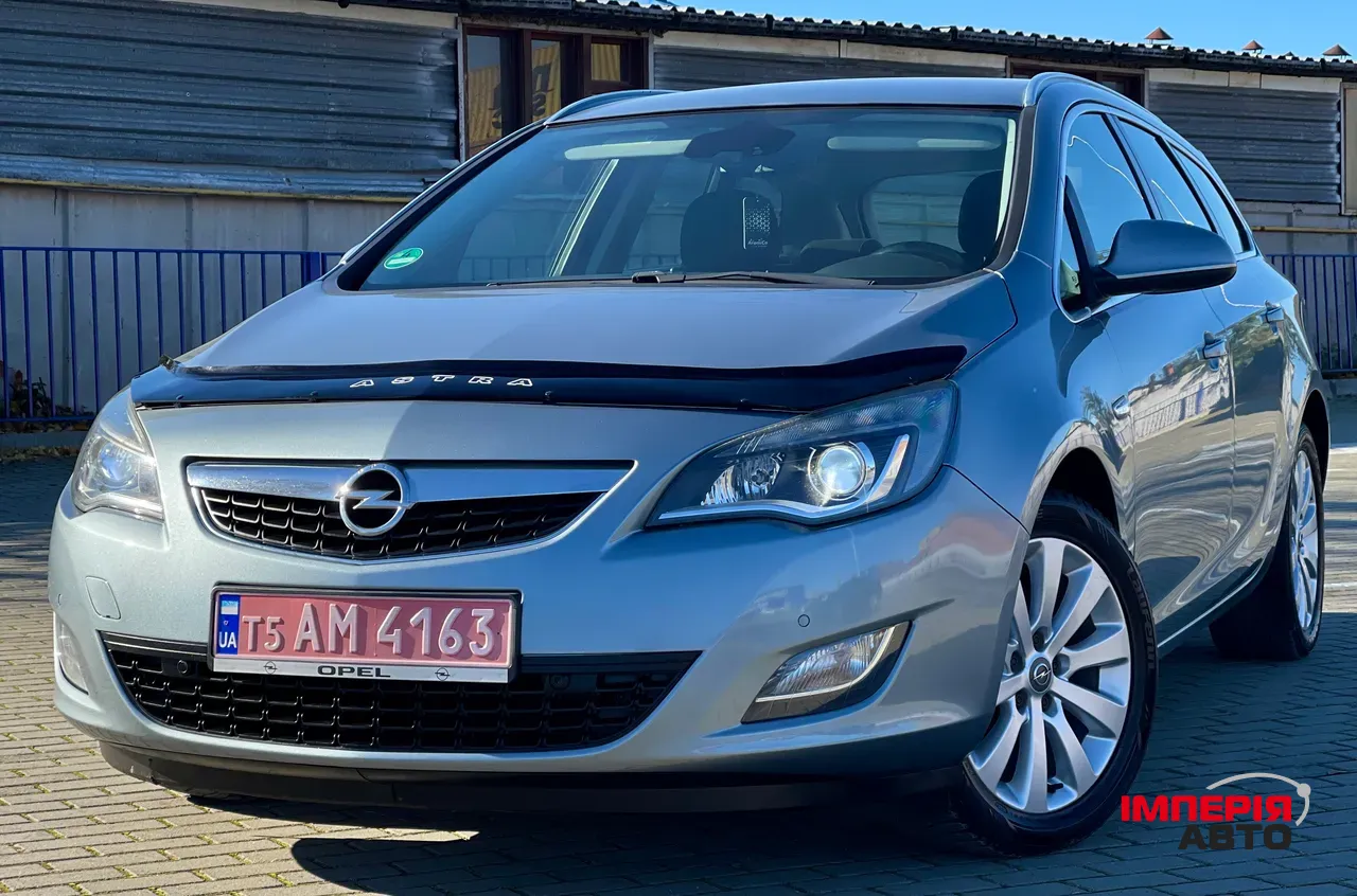 Opel Astra - фото 2