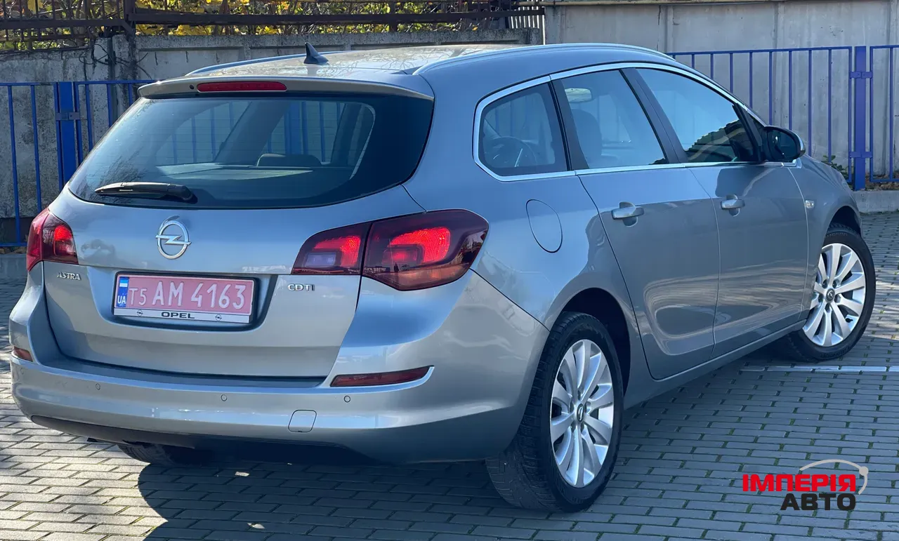 Opel Astra - фото 21