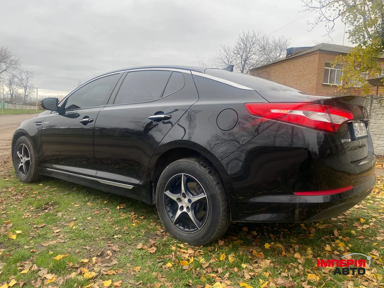 Kia Optima - фото 13