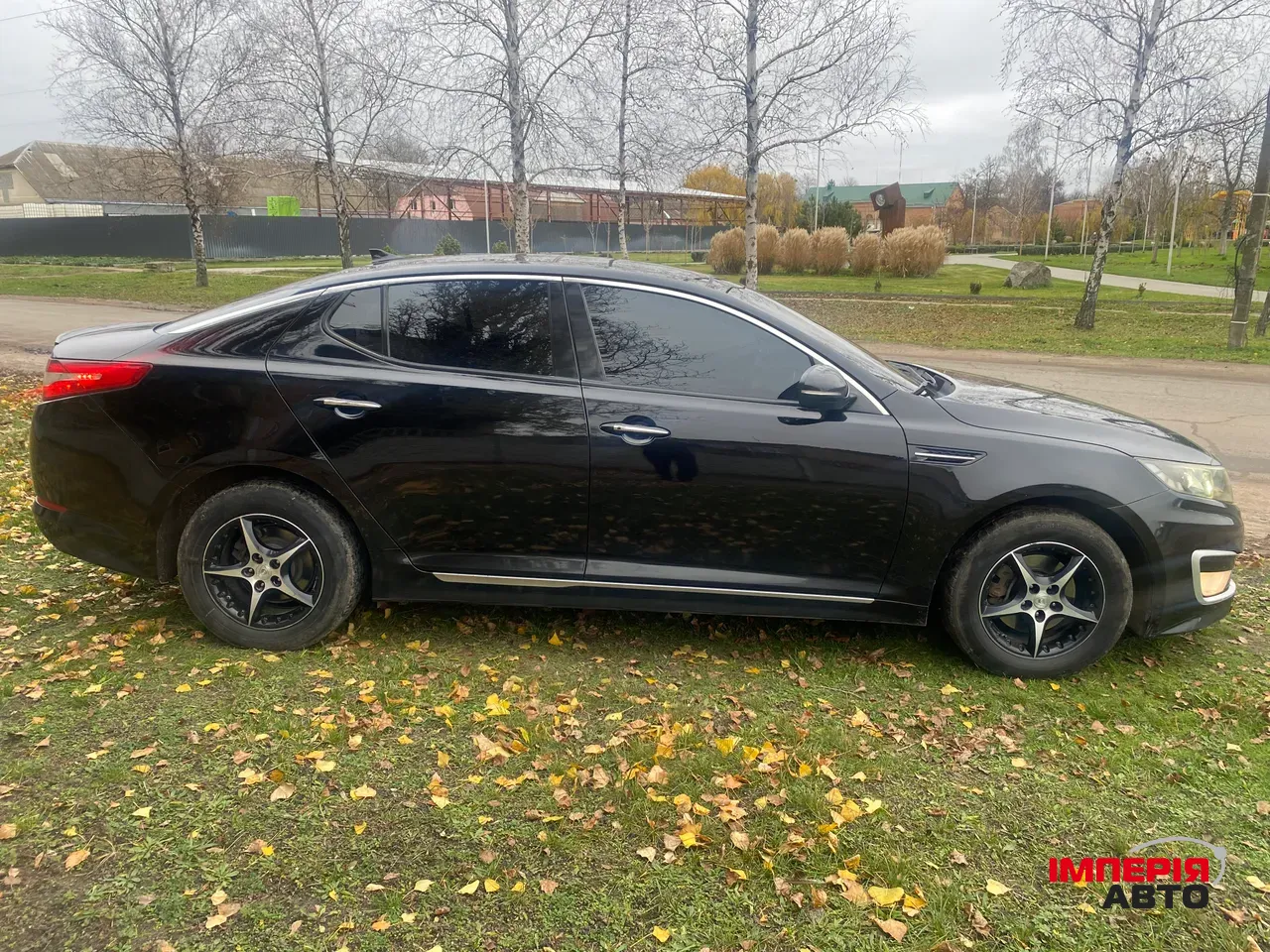 Kia Optima - фото 8