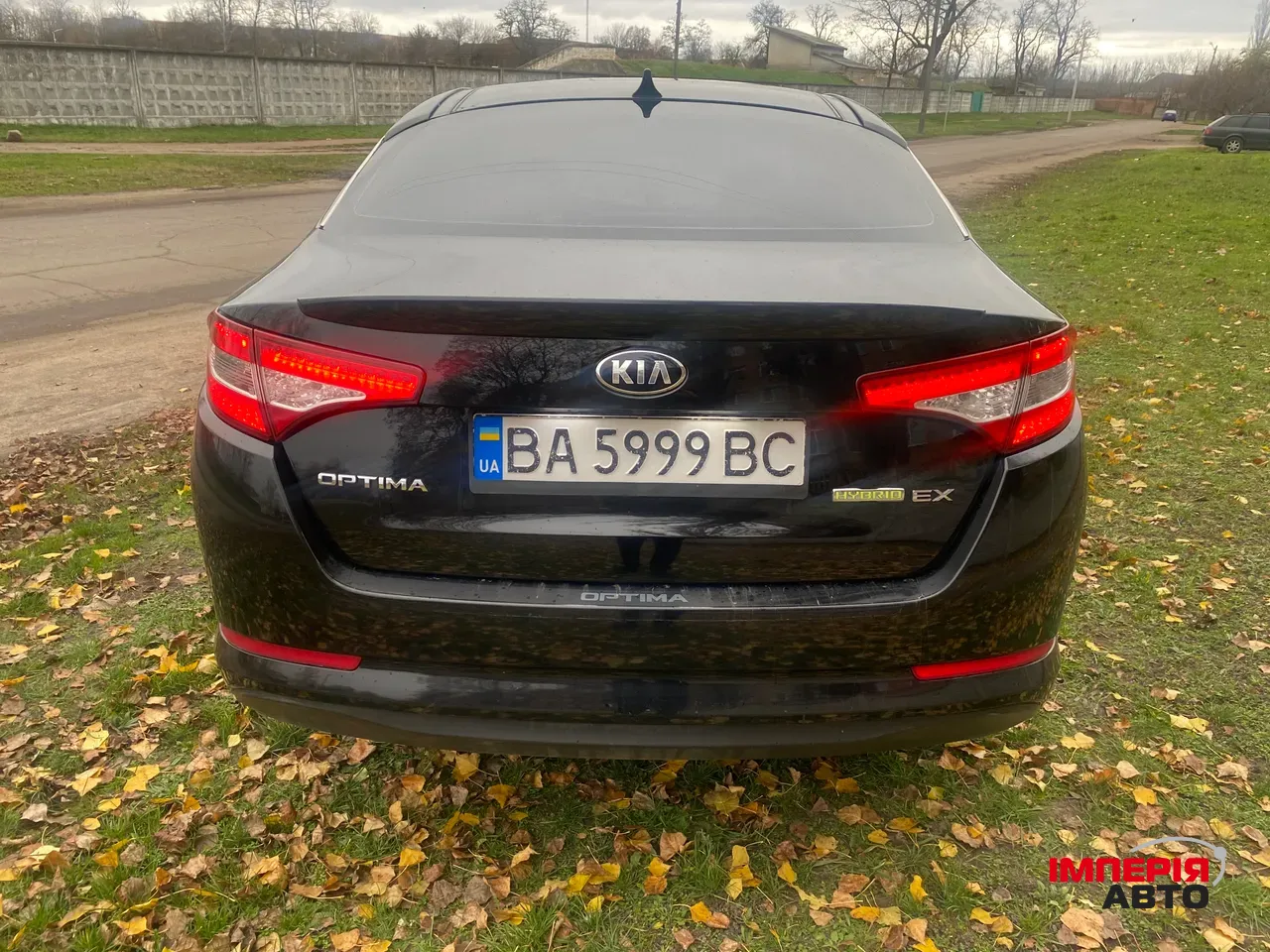 Kia Optima - фото 10