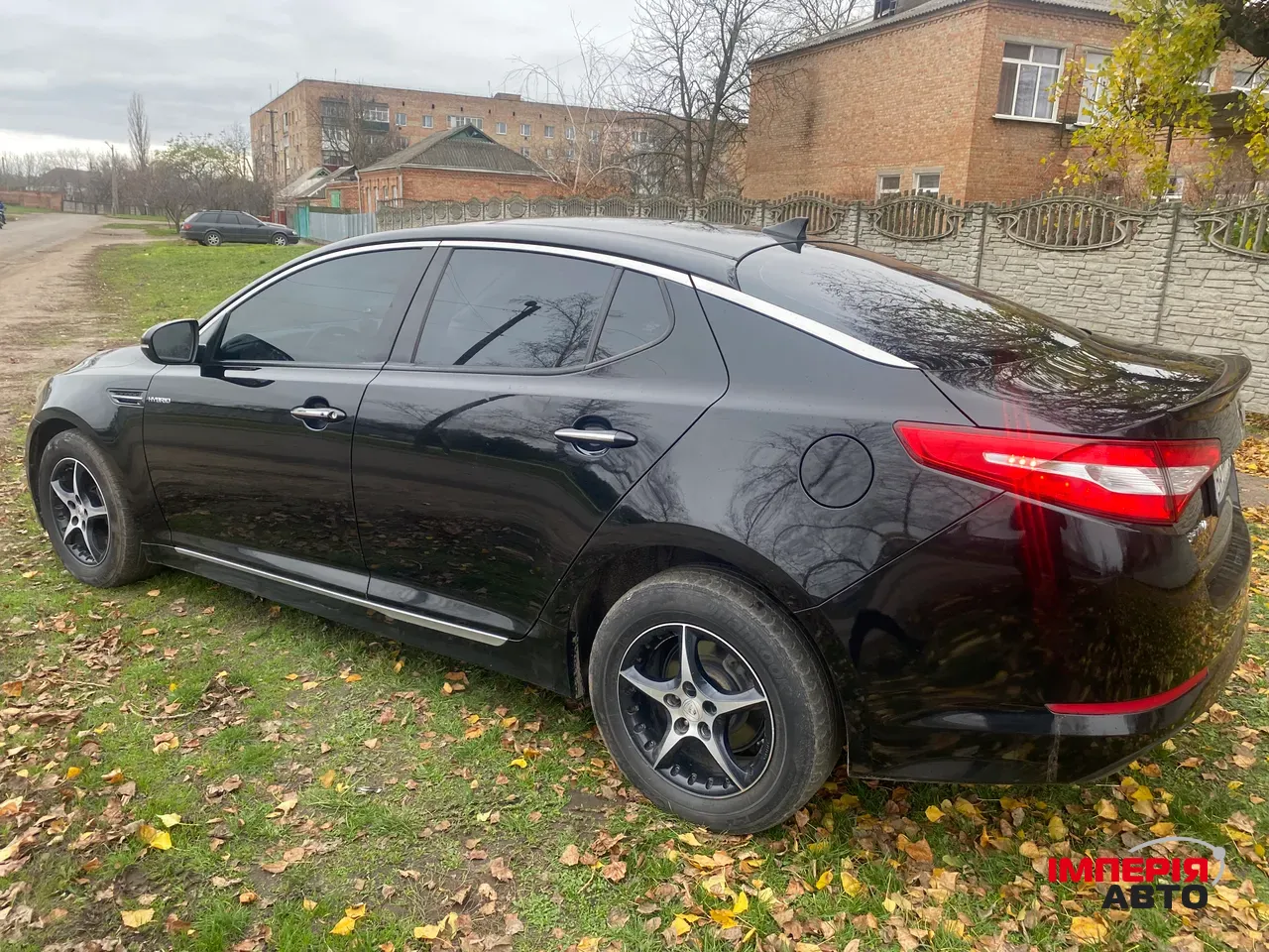 Kia Optima - фото 19