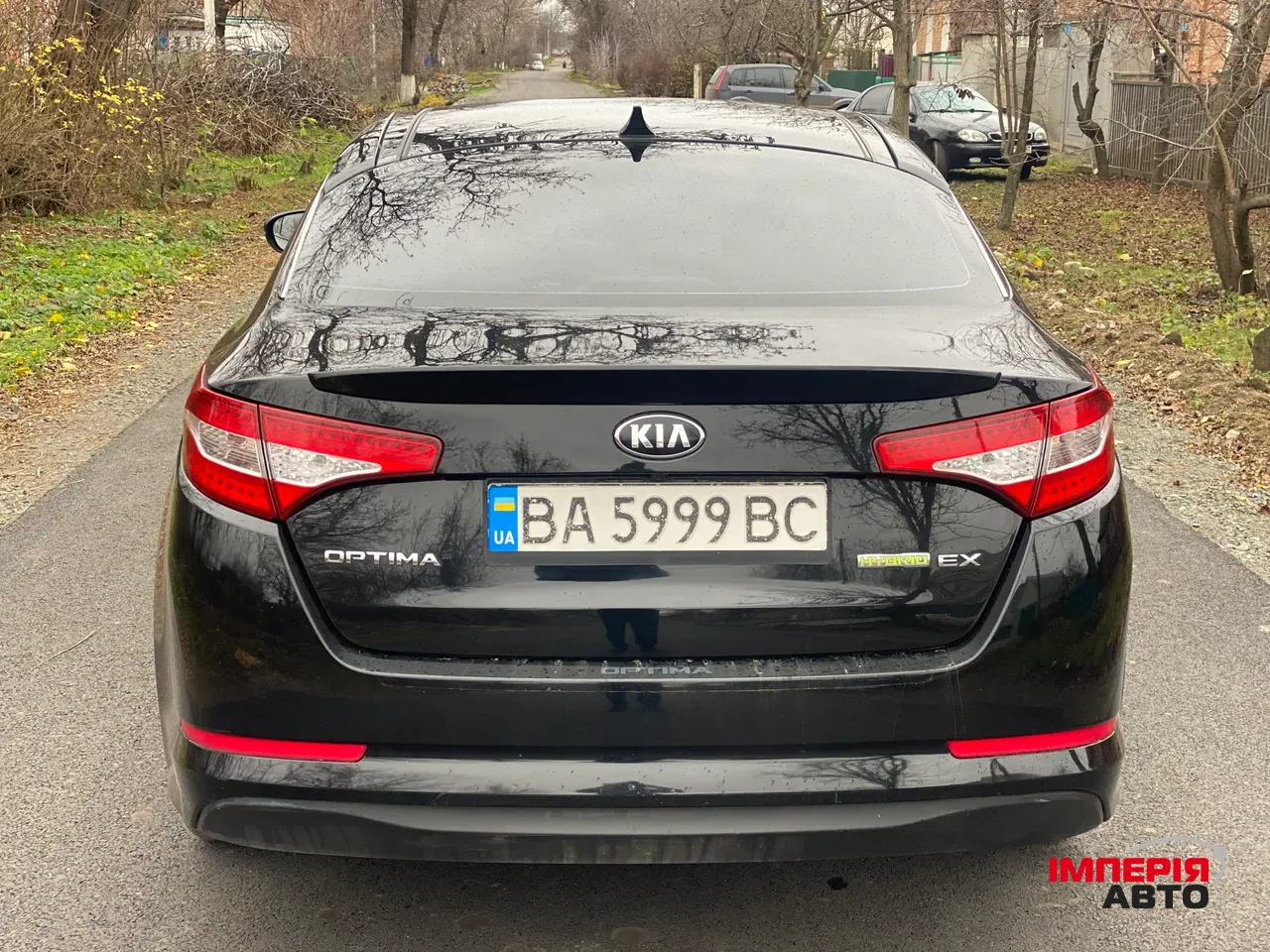 Kia Optima - фото 5