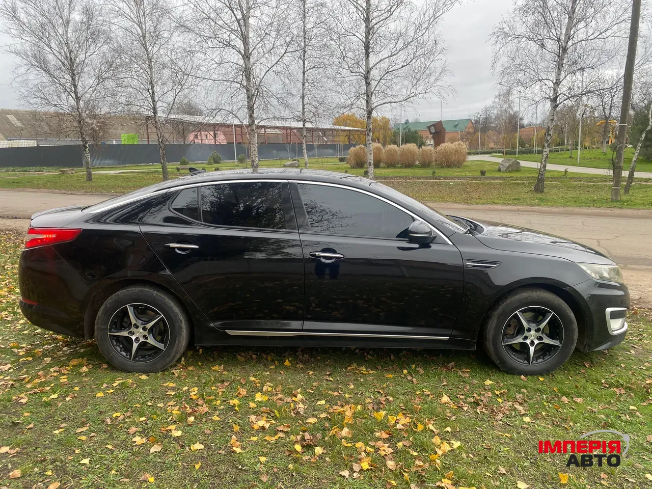 Kia Optima - фото 16
