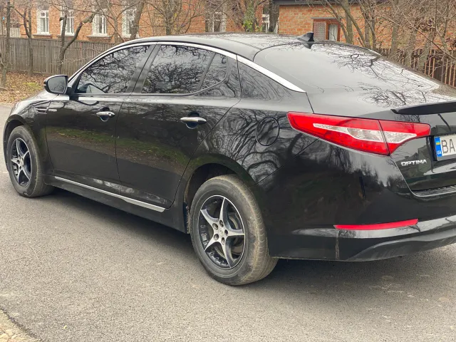 Kia Optima - фото 4