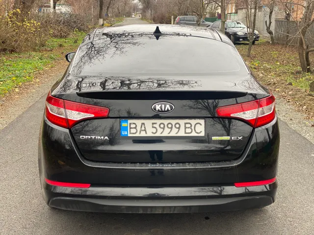 Kia Optima - фото 5