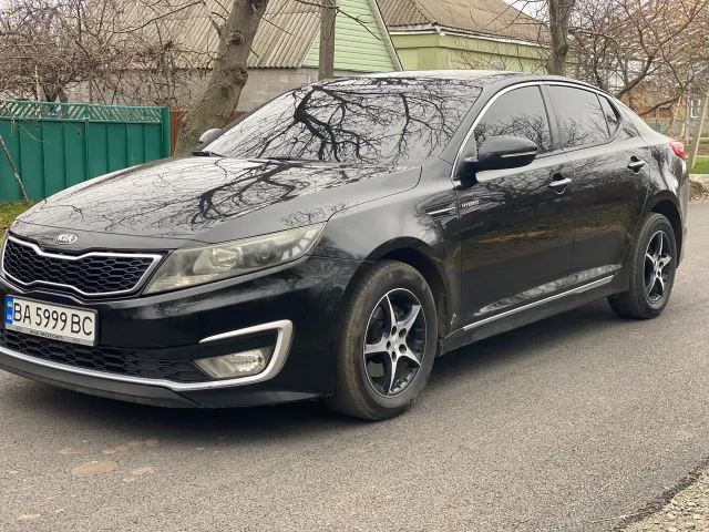Kia Optima - фото 1