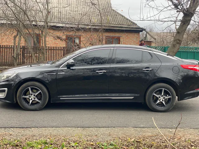Kia Optima - фото 3