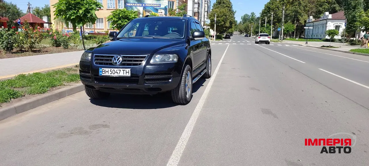 Volkswagen Touareg - фото 1