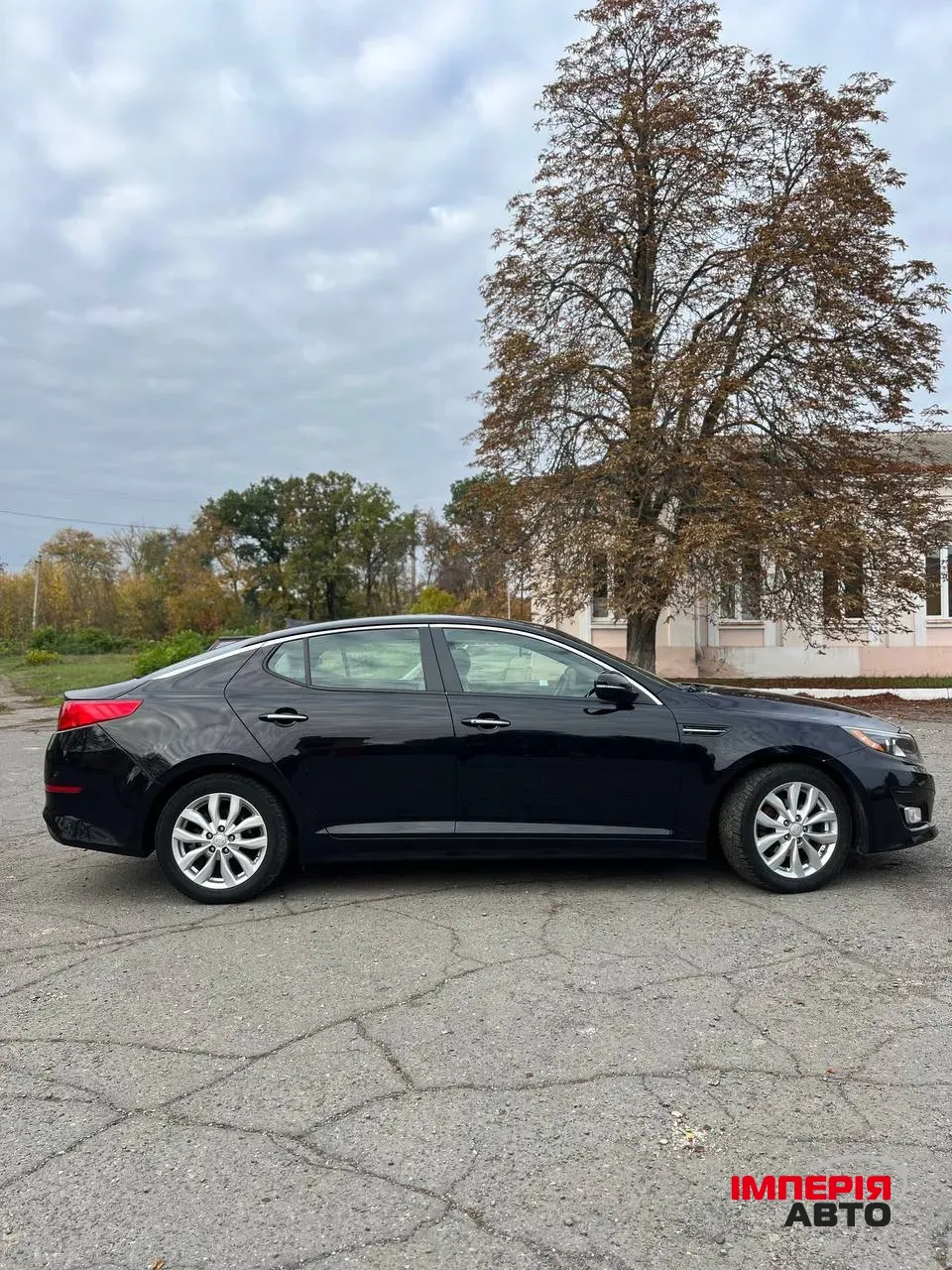 Kia Optima - фото 8
