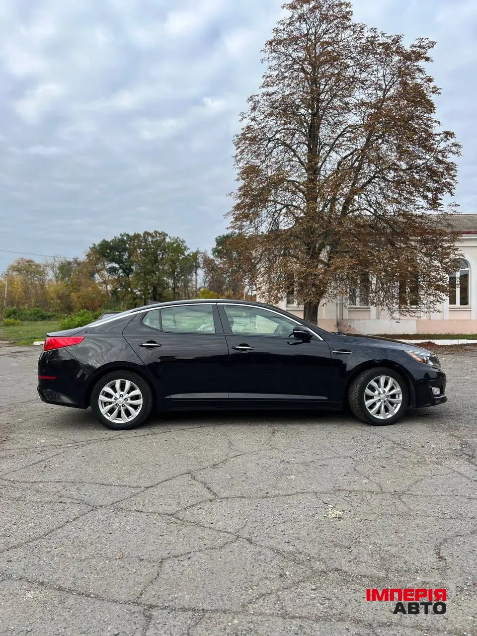 Kia Optima - фото 11