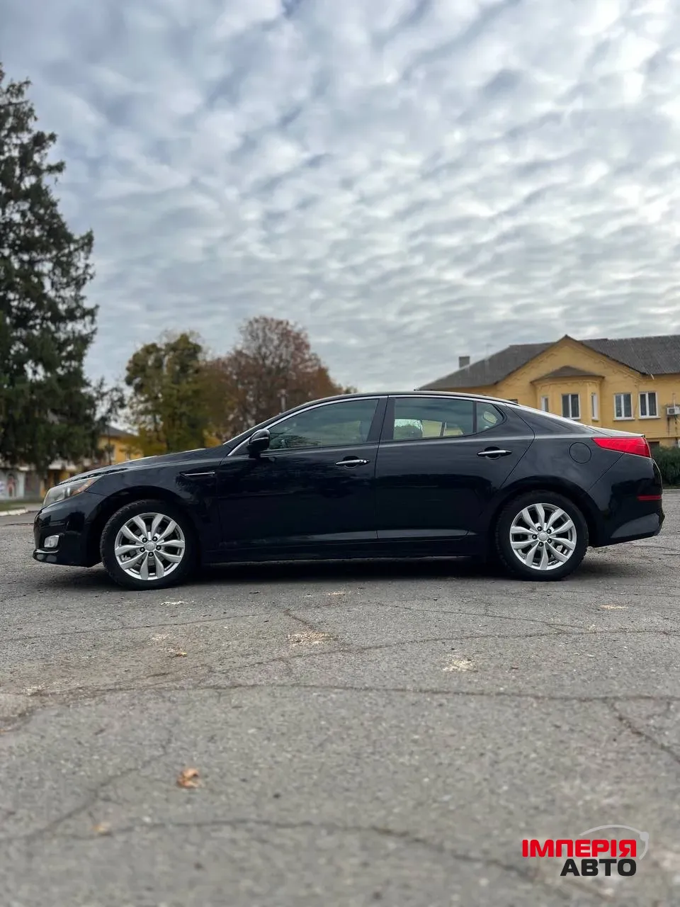 Kia Optima - фото 7