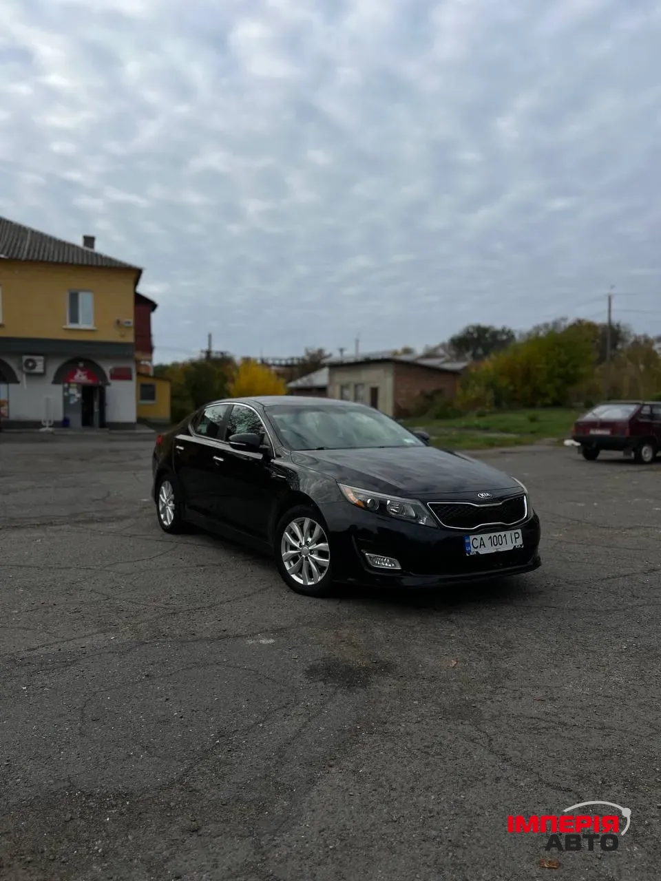 Kia Optima - фото 9