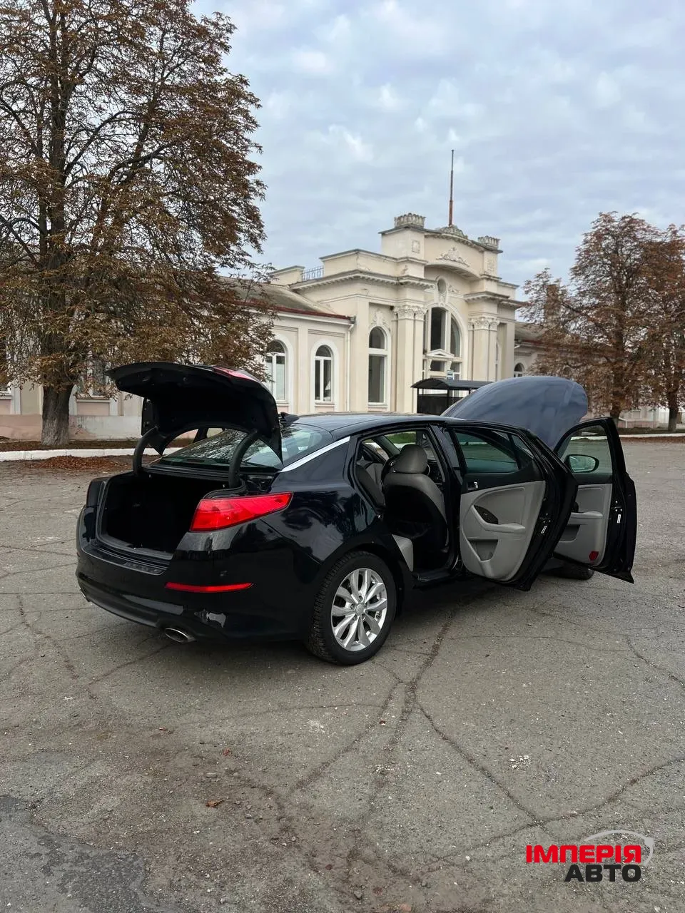 Kia Optima - фото 13