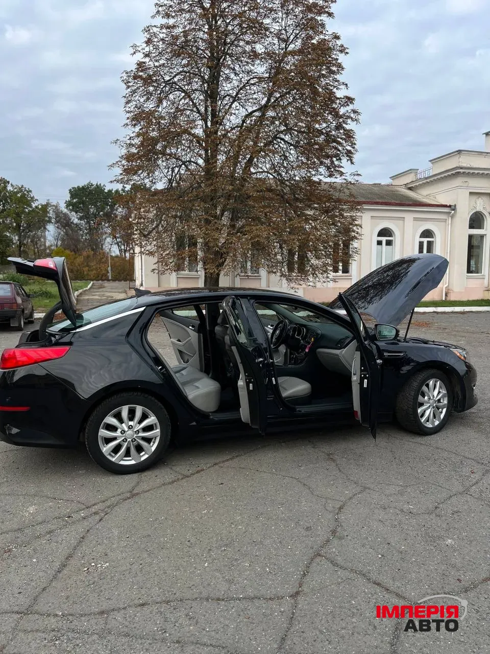 Kia Optima - фото 15